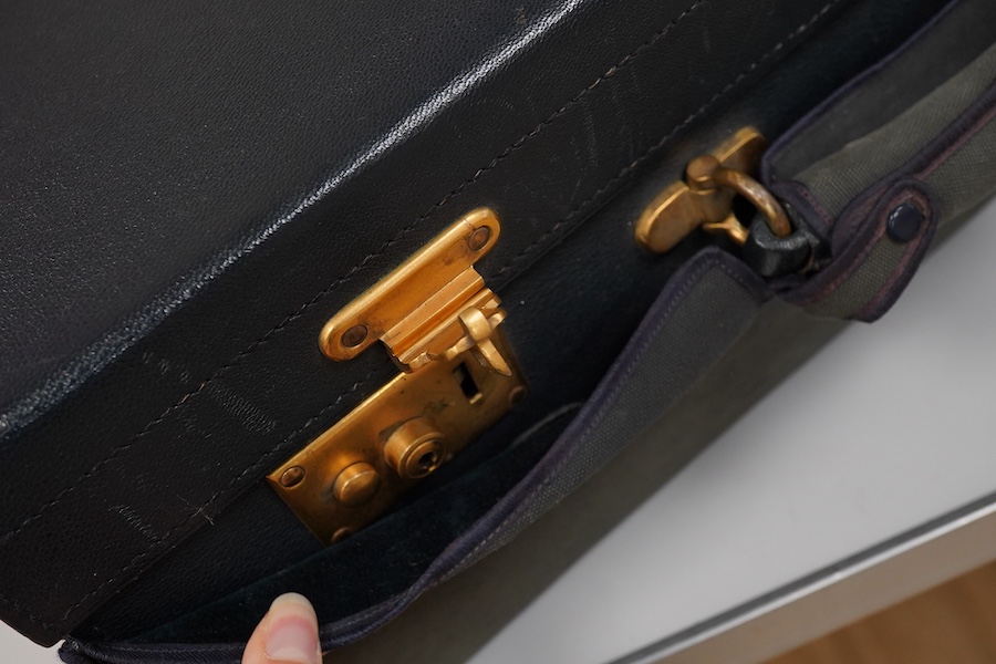 A blue morocco suitcase, moire silk lined, stamped Walker & Hall, outer cover 51cm wide x 36cm deep